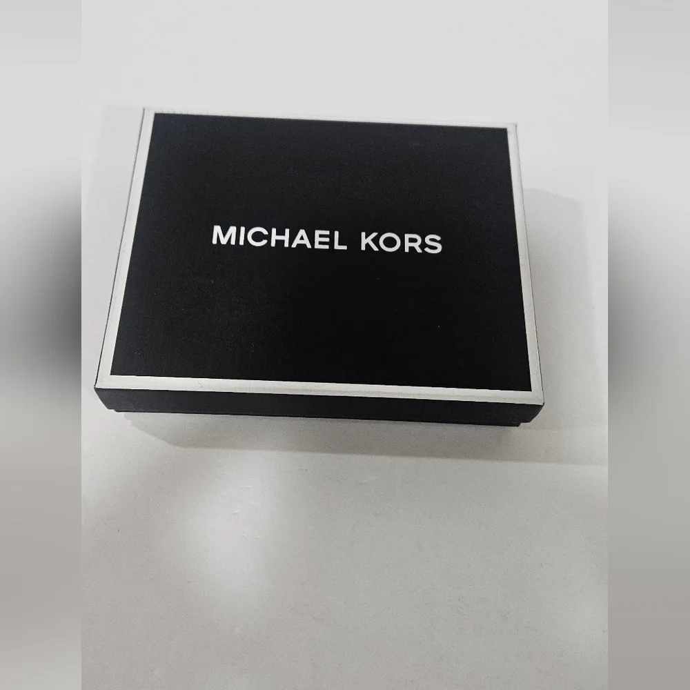 Michael Kors never used